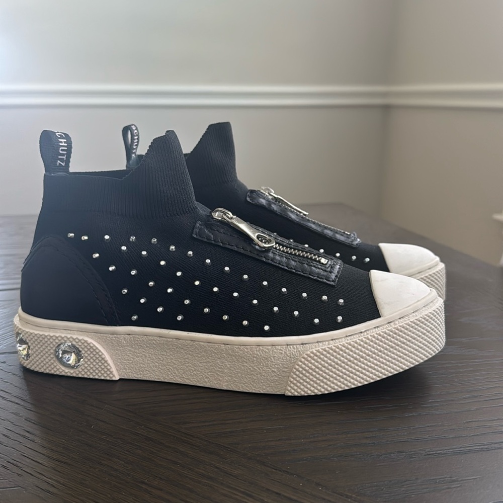 Schutz Black zip front studded slip on sneakers